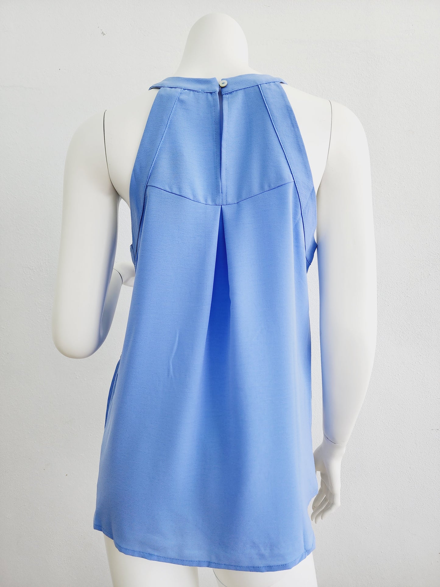 Light blue top with cream