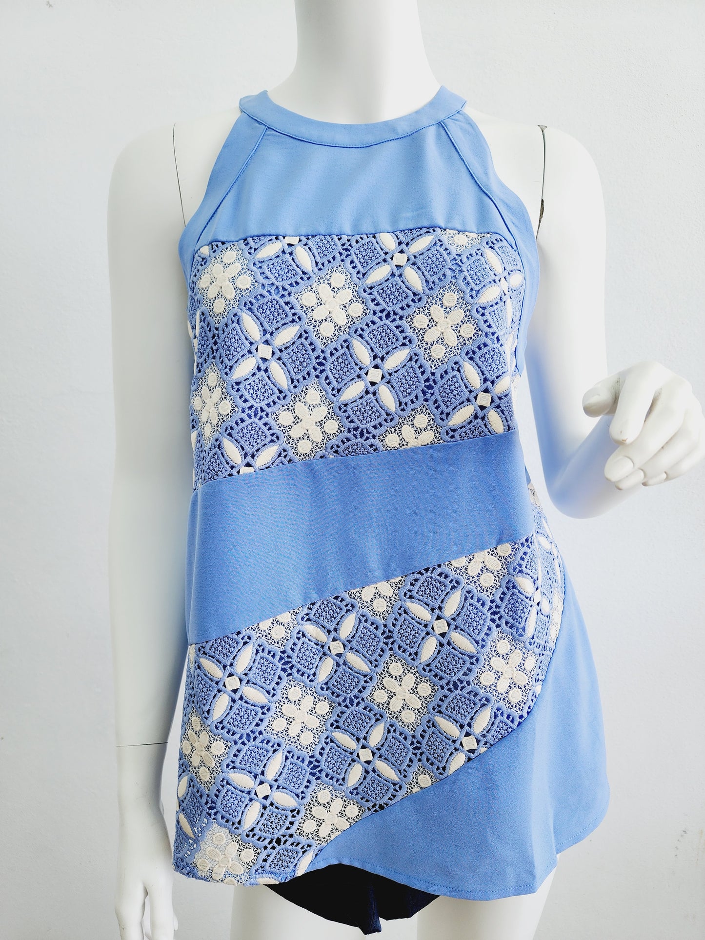 Light blue top with cream
