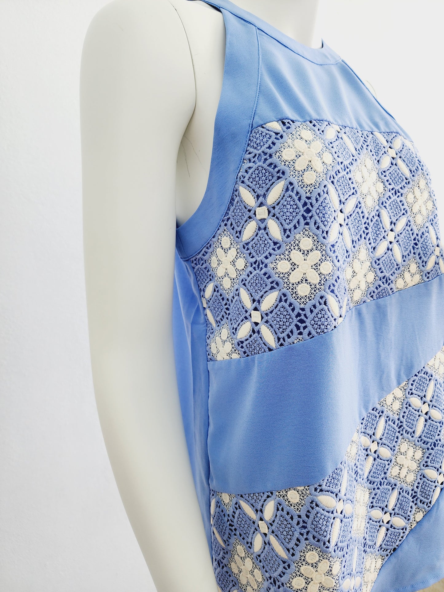 Light blue top with cream