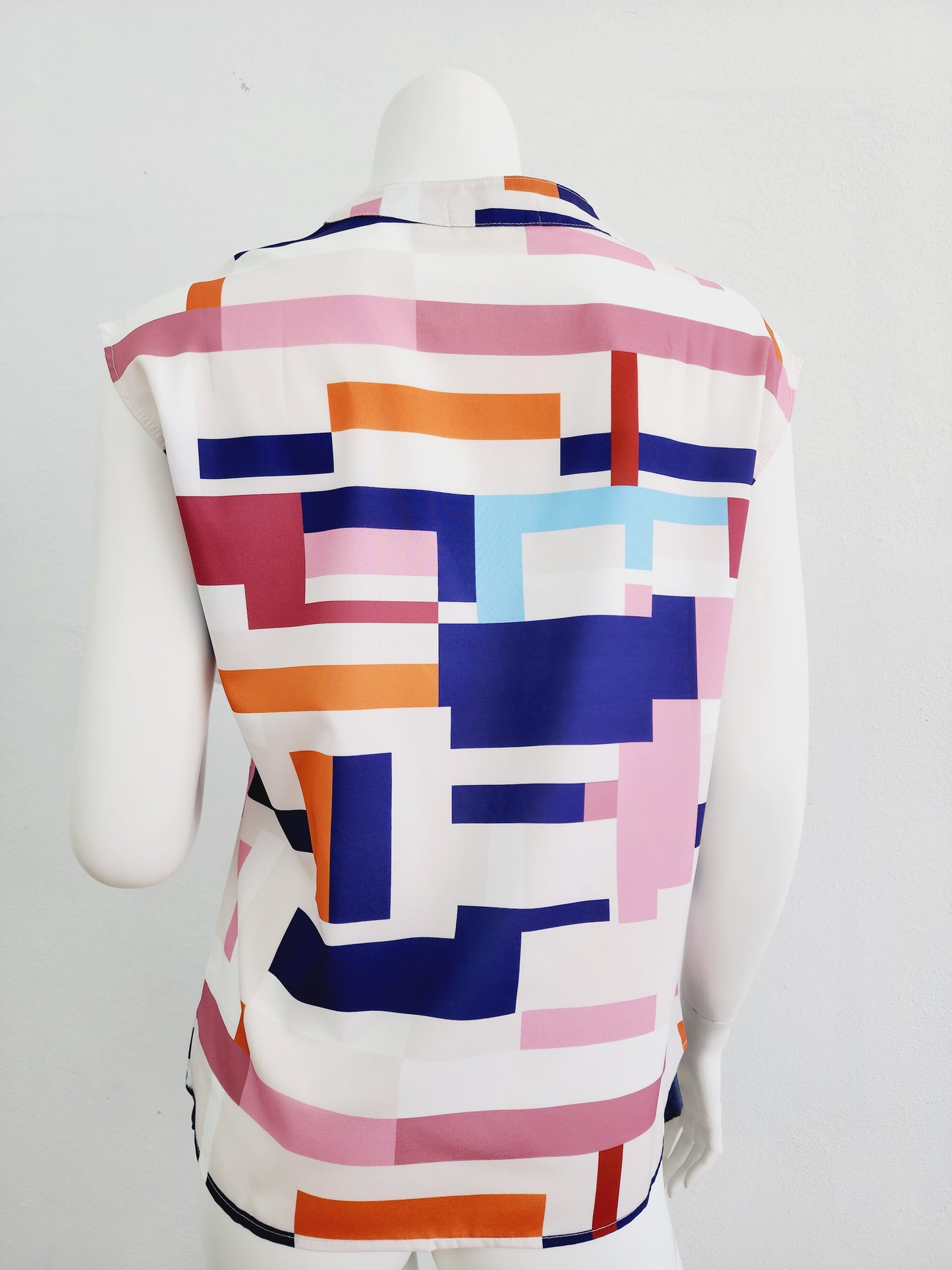 Top white background printed colors V neck