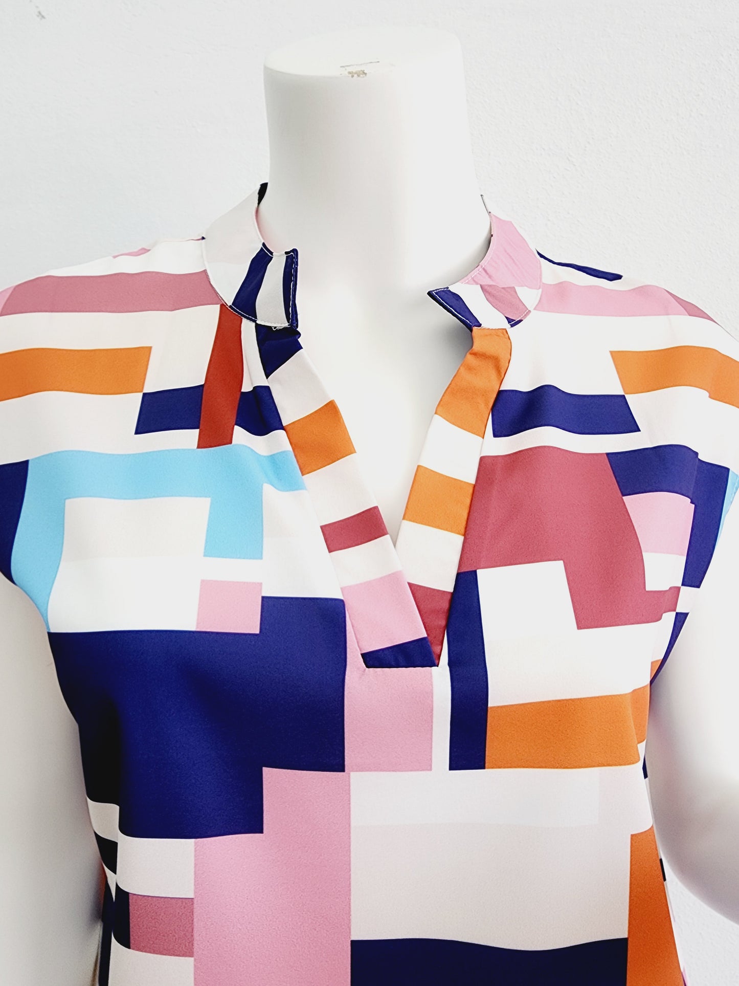 Top white background printed colors V neck