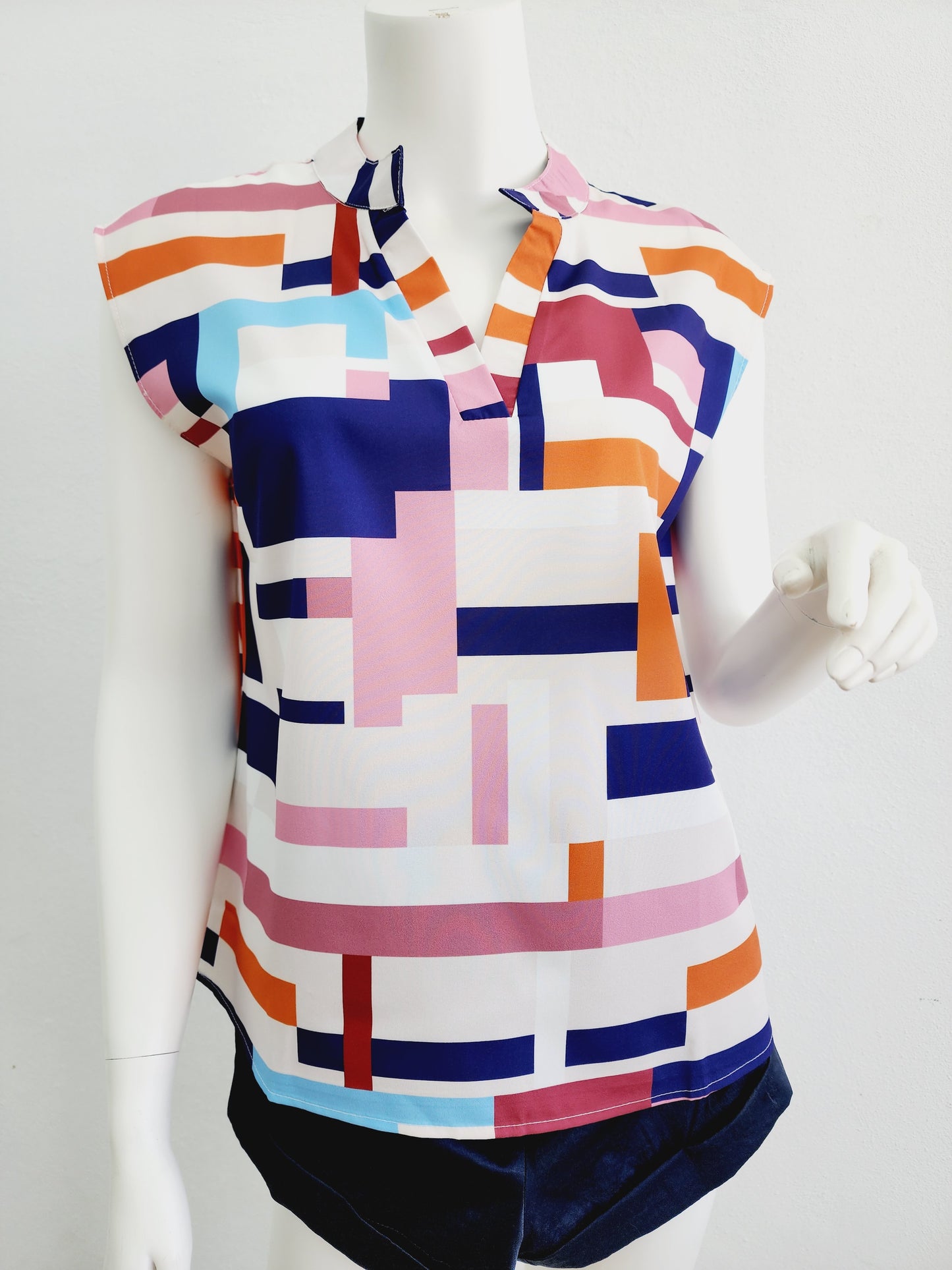 Top white background printed colors V neck