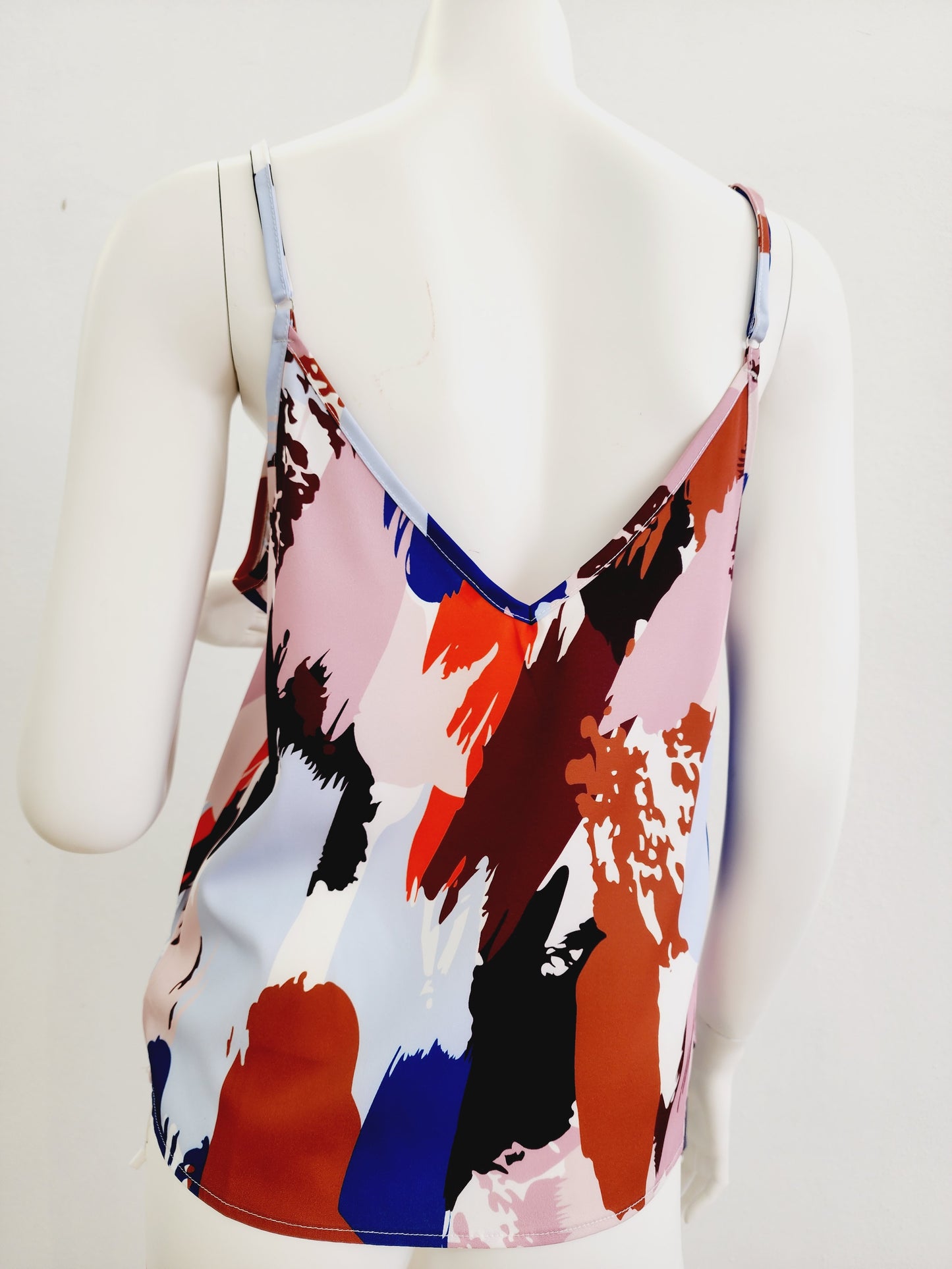 Multicolored top with spaghetti sleeves