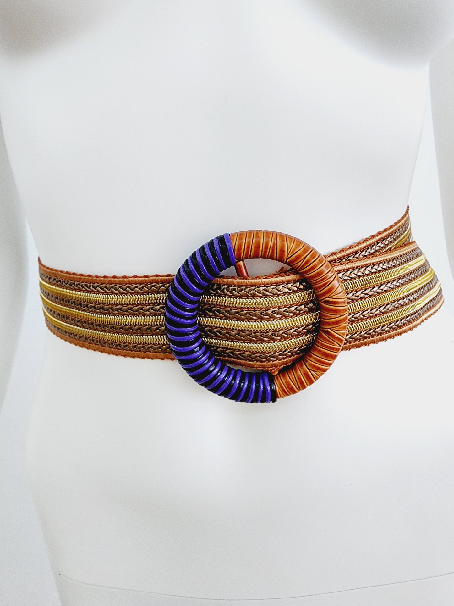 Belt (strap) in color like gold with copper and the clasp in purple, brown and black.