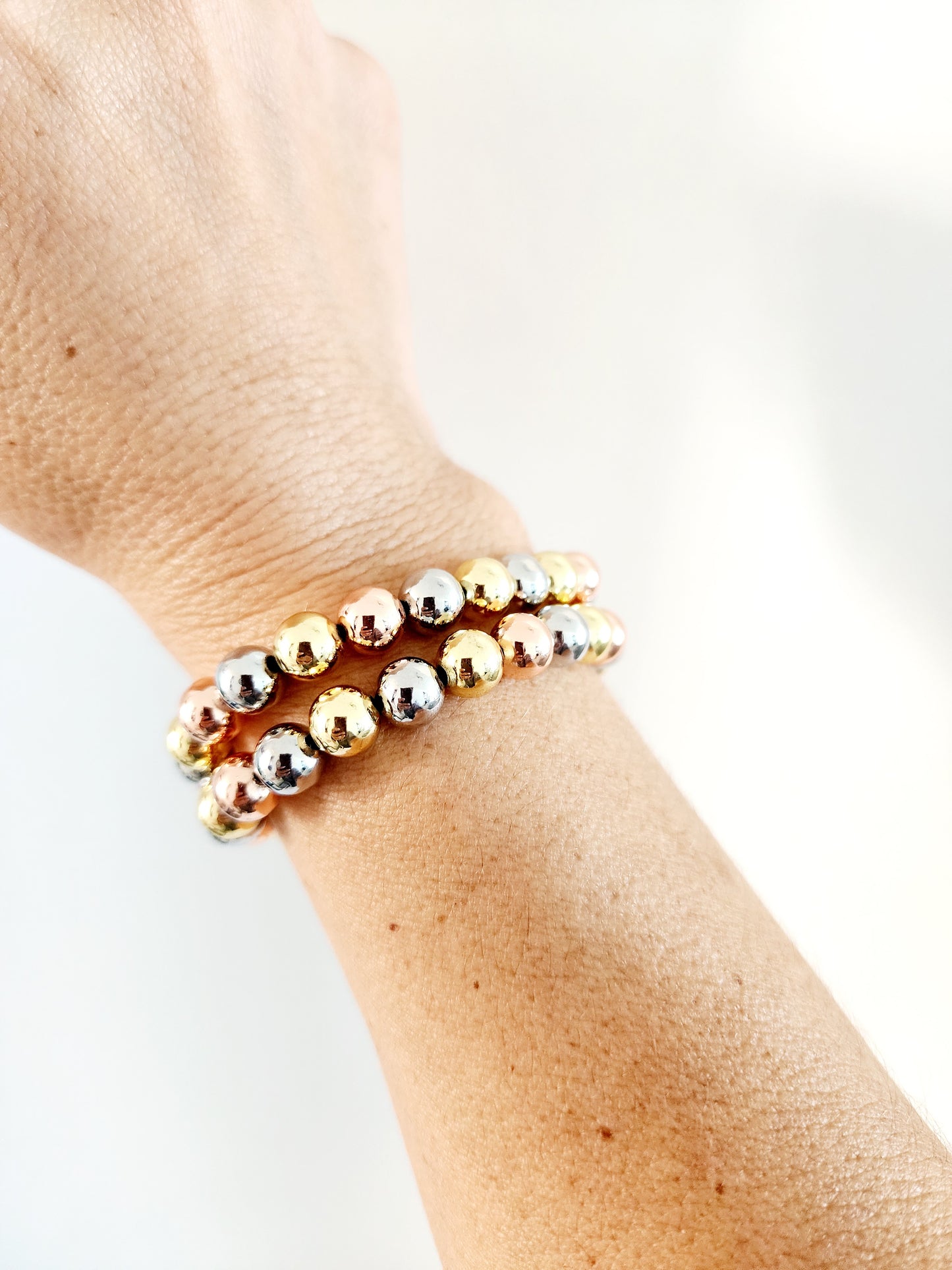 ✨ Pulsera Trio Glam – Bolas en Tres Tonos Elástica