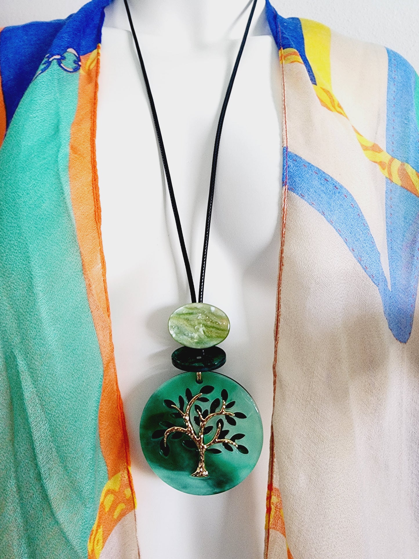 Set of earrings and long necklace with tree of life