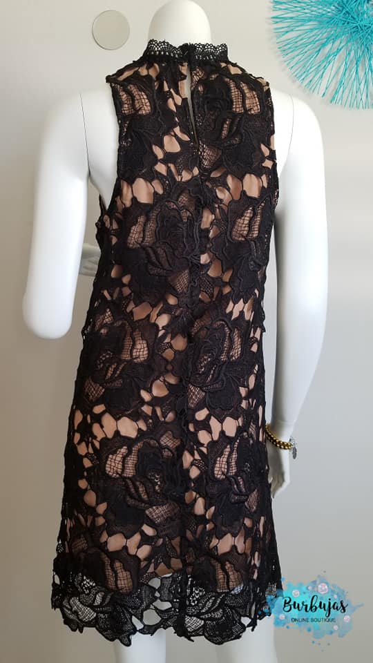 Black lace dress with cream lining and high neck, sleeveless