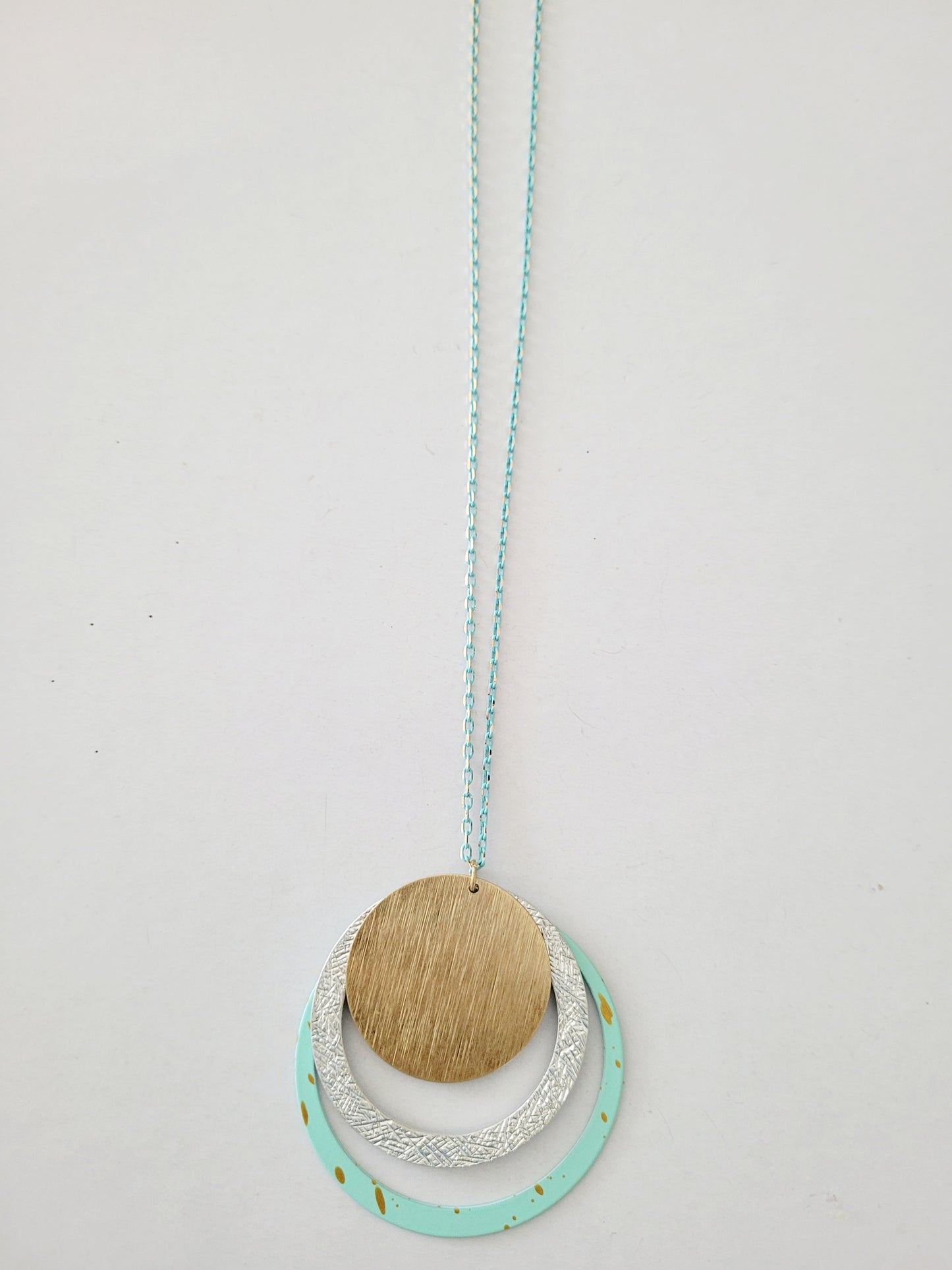 Long necklace with 3 round pendants