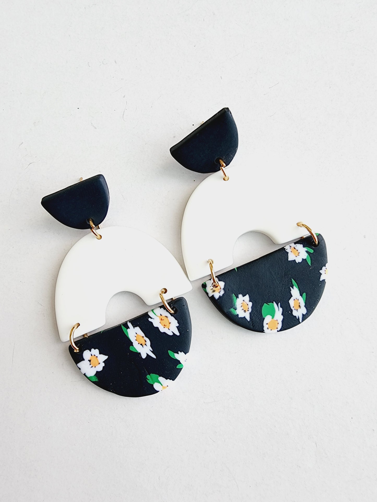 Navy blue polymer earring with flowers