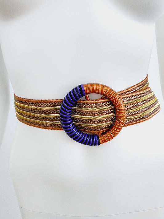 Belt (strap) in color like gold with copper and the clasp in purple, brown and black.