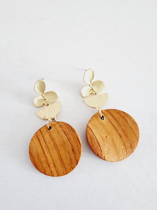Wooden earring with golden flower