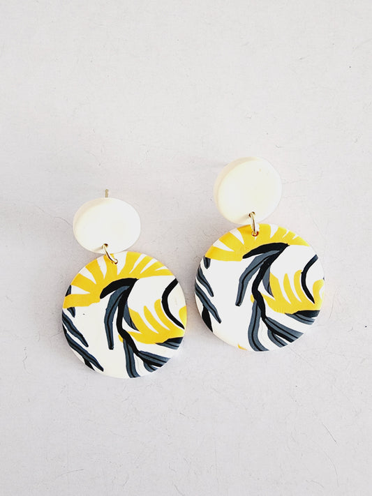 Polymer earrings with design in easy-to-match colors.