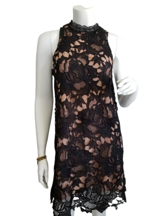 Black lace dress with cream lining and high neck, sleeveless