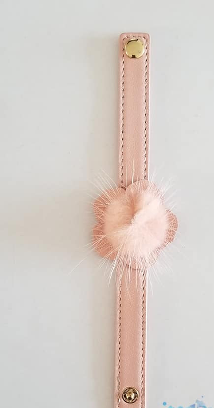 Pink leather bracelet with hairy top